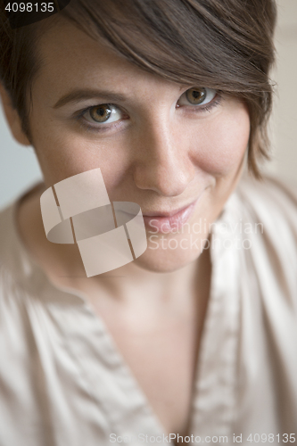 Image of Indoor portrait of natural woman