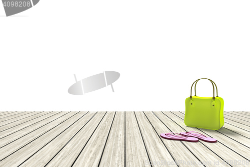 Image of green bag on a wooden floor with white background