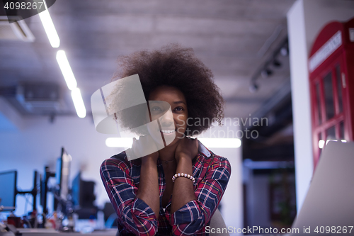 Image of portrait of a young successful African-American woman in modern 