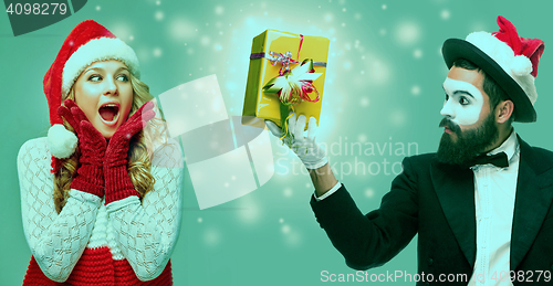 Image of portrait of girl dressed in santa hat 