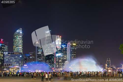 Image of  Marina Bay Sands at night during Light and Water Show \'Wonder F