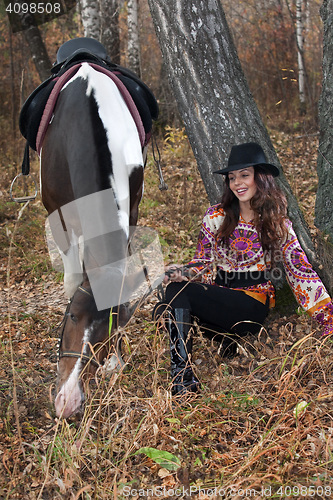 Image of Young Woman And Horse