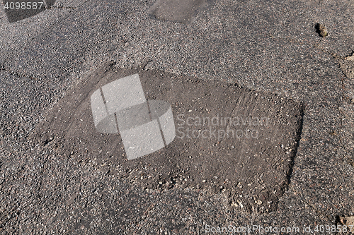 Image of broken part of the road