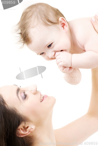 Image of laughing blue-eyed baby playing with mom