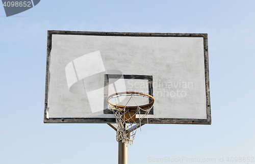 Image of basketball hoop in the street