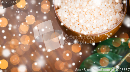 Image of close up of himalayan pink salt in wooden bowl