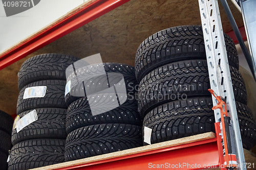 Image of tires at car shop or warehouse