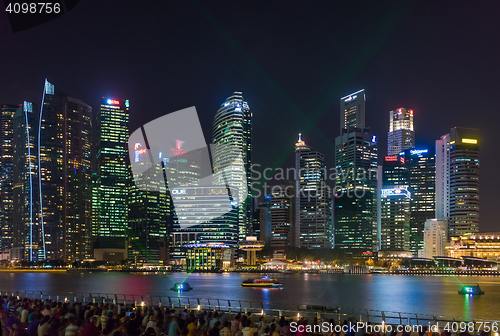 Image of  Marina Bay Sands at night during Light and Water Show \'Wonder F