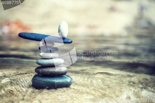 Image of Rock Zen Stack in front of waterfall.