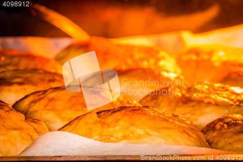 Image of Close-up of buns in a oven