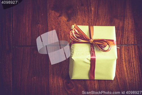 Image of Green gift with a ribbon