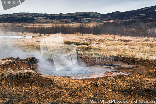 Image of Boiling water in a puddle