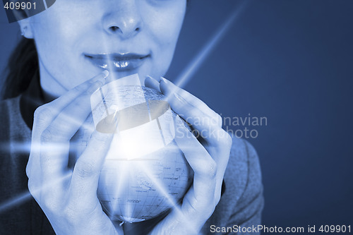 Image of Globe in a girl's hands