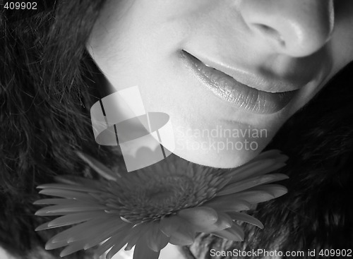 Image of Girl with a red flower