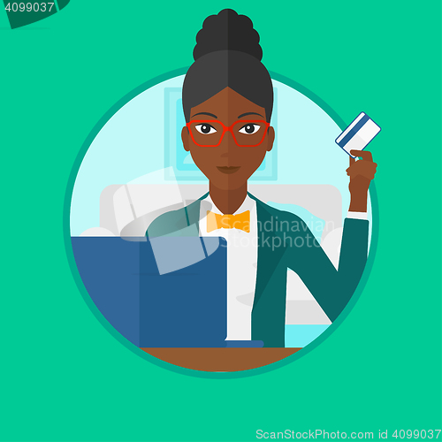 Image of Woman shopping online using her laptop.