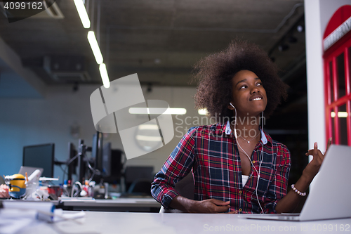 Image of portrait of a young successful African-American woman in modern 