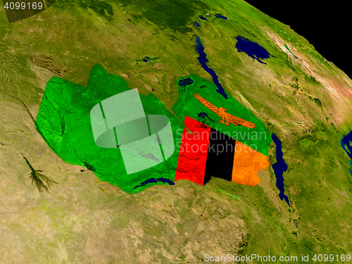 Image of Zambia with flag on Earth