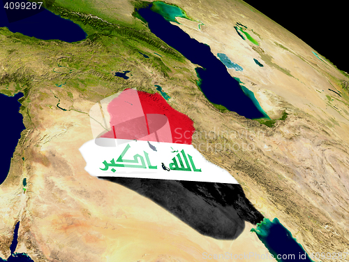 Image of Iraq with flag on Earth
