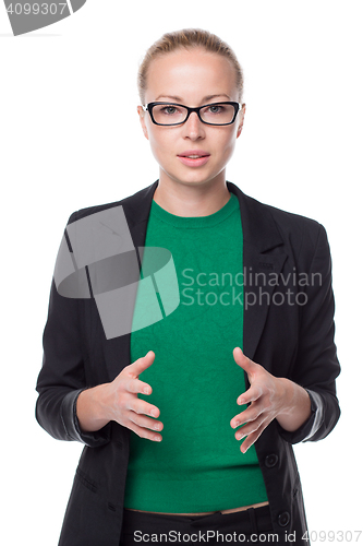 Image of Business woman standing with arms crossed against white background..