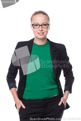 Image of Business woman standing with arms crossed against white background..