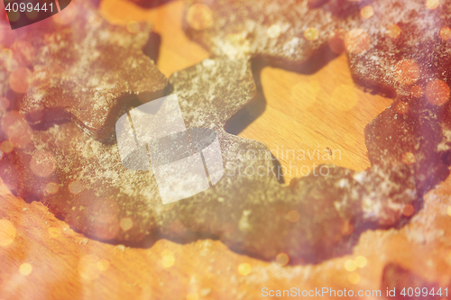 Image of close up of ginger dough on wooden board