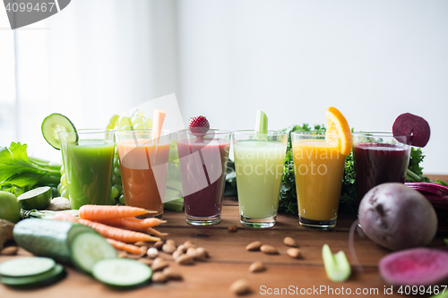 Image of glasses with different fruit or vegetable juices