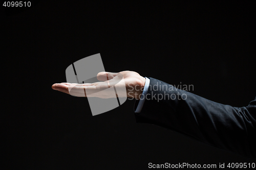 Image of close up of businessman with empty hand