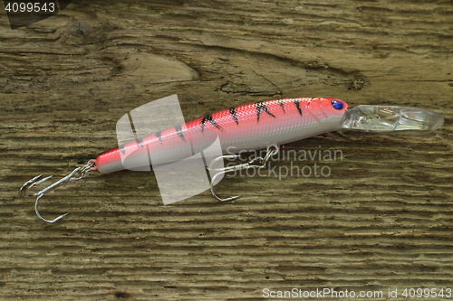 Image of  red wobbler bait for fishing