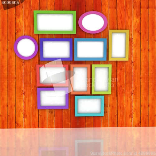 Image of Mock up picture frames on wood wall. 3d illustration