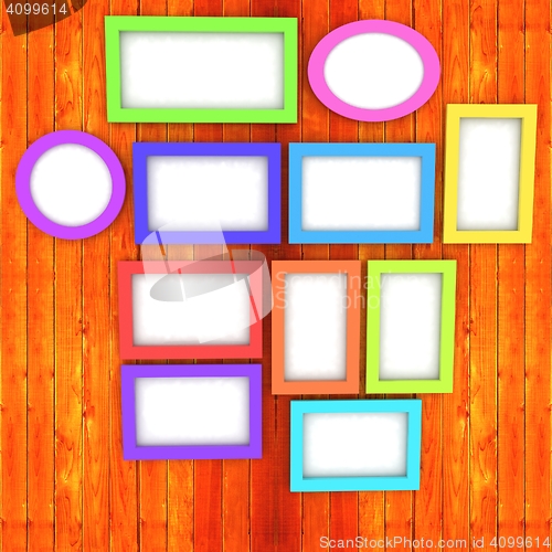 Image of Mock up picture frames on wood wall. 3d illustration