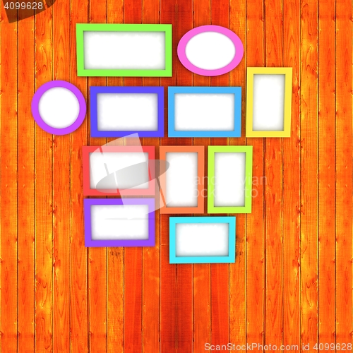 Image of Mock up picture frames on wood wall. 3d illustration