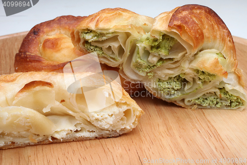 Image of Burek (pie with meat, cheese or spinach) is traditional Balkanian meal