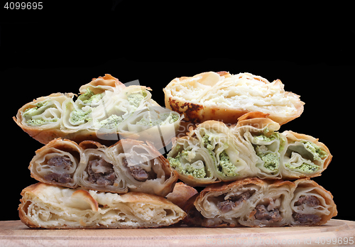 Image of Burek (pie with meat, cheese or spinach) is traditional Balkanian meal