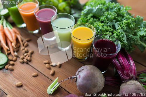 Image of glasses with different fruit or vegetable juices