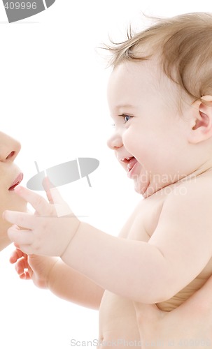 Image of happy cuddle with mother