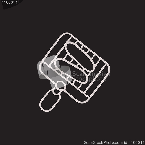 Image of Grilled sausage on grate for barbecue sketch icon.