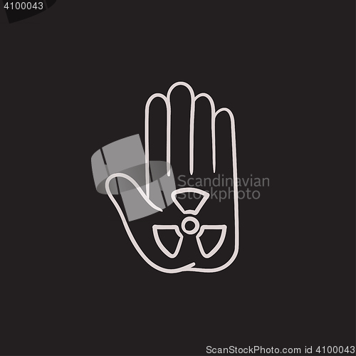 Image of Ionizing radiation sign on a palm sketch icon.
