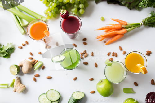 Image of glasses with different fruit or vegetable juices