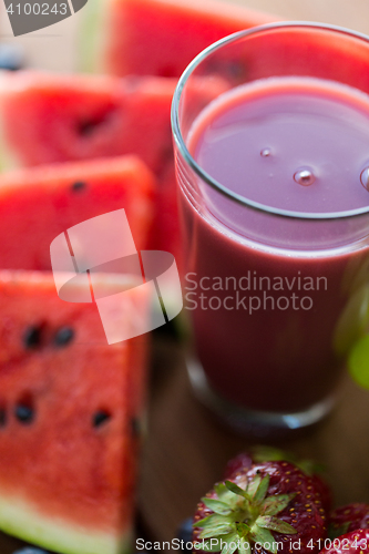 Image of close up of fruit  juice or smoothie glass