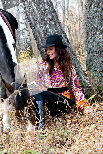 Image of Young Woman And Horse