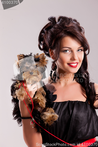 Image of Young Woman With A Little Dog