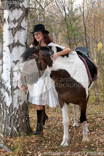 Image of Young Woman And Horse