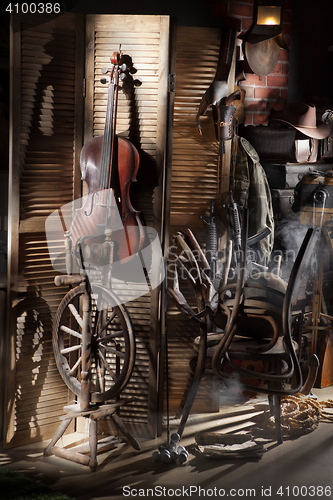 Image of Still Life With Old Cello And Spinning Wheel