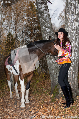 Image of Young Woman And Horse