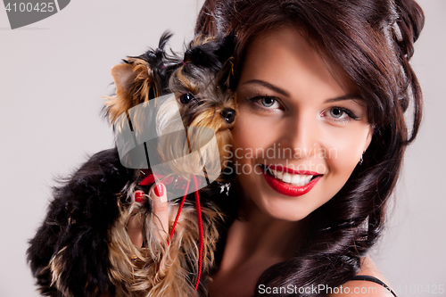 Image of Young Woman With A Little Dog