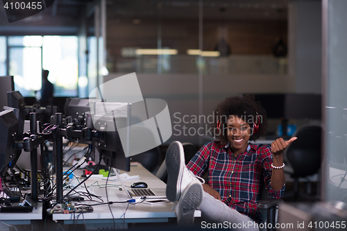 Image of portrait of a young successful African-American woman in modern 