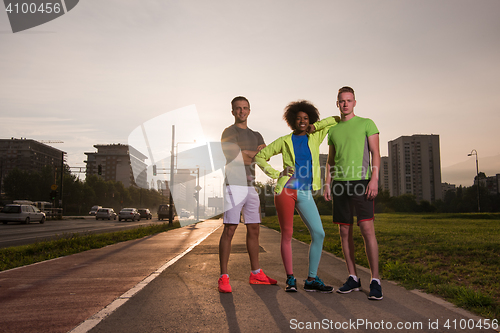 Image of portrait multiethnic group of people on the jogging