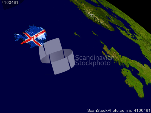 Image of Iceland with flag on Earth