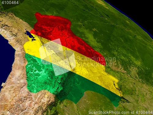Image of Bolivia with flag on Earth