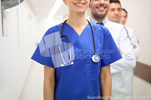 Image of close up of medics or doctors at hospital corridor